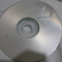 A close up of a cd
AI-generated content may be incorrect.