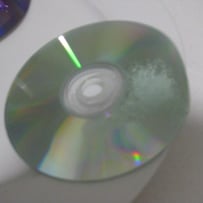 A close-up of a cd
AI-generated content may be incorrect.