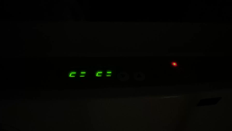 A black device with green lights
AI-generated content may be incorrect.