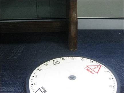 A circular object on the floor
AI-generated content may be incorrect.